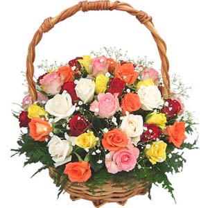 18 Mixed color flowers arrangement in a basket