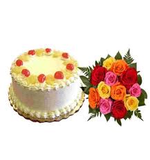 1/2 kg eggless Pineapple Cake with 4 pink roses