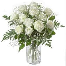 White roses vase