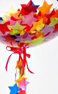 Transparent Balloon with paper stars inside and trailing