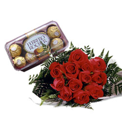 Red roses and 16 pieces ferrero rocher.