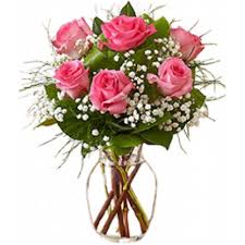 6 pink roses in a vase